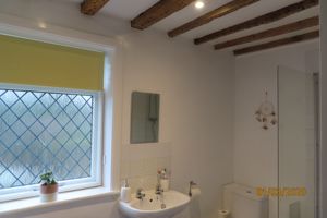 Timbered ceiling to pretty bathroom- click for photo gallery